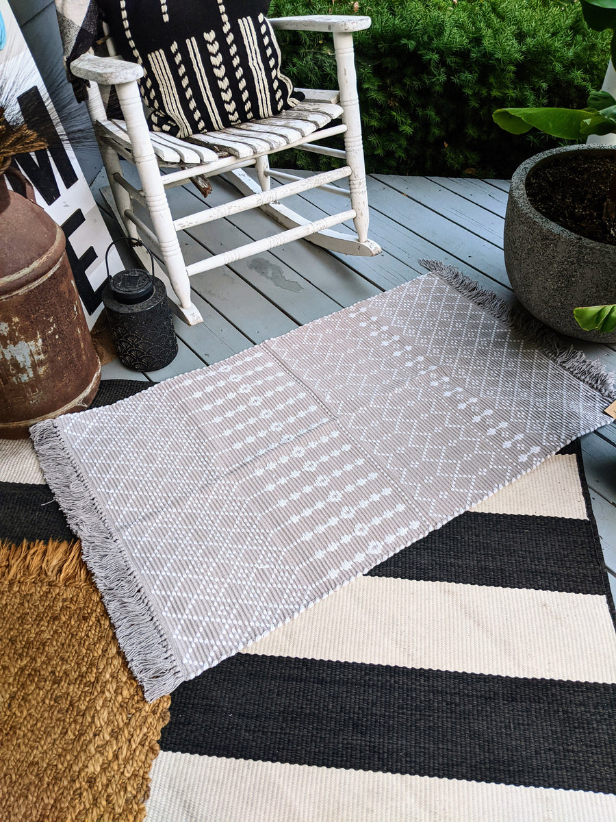 Grey and White Woven Tassel Layering Rug Pocketful of Posies