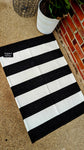 Black and White Striped Layering Rug