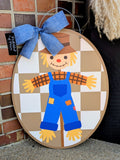 Fundraiser: Checkered Scarecrow Door Hanger